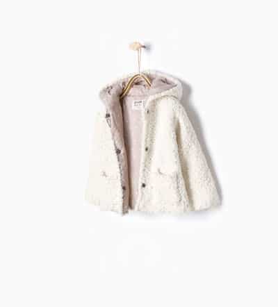Knitted three quarter length coat with hood