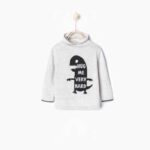 Sweater with wraparound collar